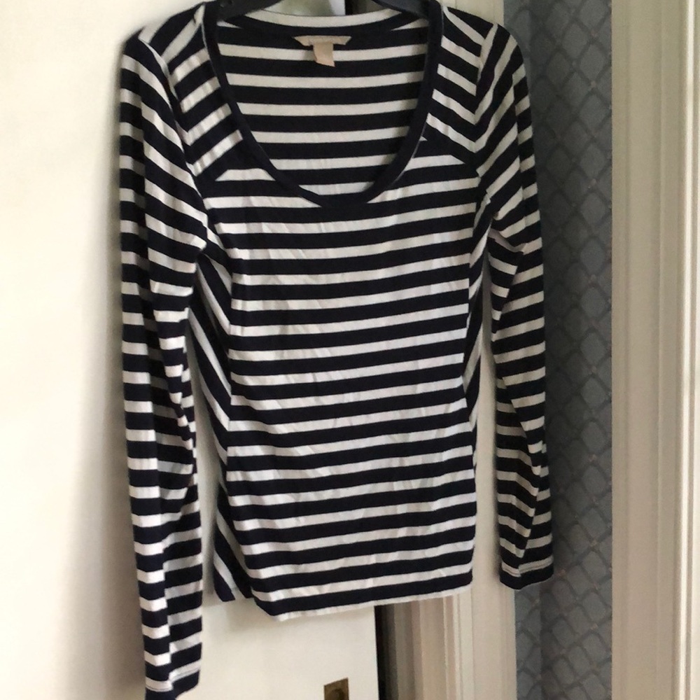 Bold deep navy/white striped long sleeve top with diagonal striped detail.